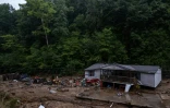 Une maison endommagée par les inondations près de Jackson, le 31 juillet 2022 dans le Kentucky