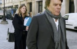 Bernard Tapie à son arrivée au pôle financier du tribunal de grande instance le 12 mars 2015 à Paris