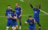 La joie des joueurs du XV de France, après leur victoire 32-30 face au pays de Galles, lors du Tournoi des Six nations, le 20 mars 2021 au Stade de France à Saint-Denis