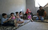 Des refugiés syriens logés dans un appartement à Irbid, en Jordanie, le 9 août 2017