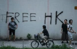 Un graffiti réclamant "Libérez Hong Kong" dans le quartier de Tai Wai, à Hong Kong le 10 août 2019