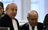 L'ancien patron du renseignement intérieur Bernard Squarcini (d) arrive au tribunal à Paris, le 28 novembre 2024