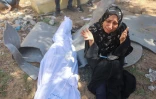 Une Palestinienne pleure un proche tué lors d'une frappe imputée à Israël sur le camp de réfugiés d'al-Chati dans l'ouest de la ville de Gaza, le 13 juillet 2024