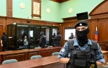 Un groupe de prévenus accusés d'avoir participé à l'attaque à main armée perpétrée en 2024 dans la salle de concert Crocus City Hall, qui a fait 149 morts, comparaît devant le tribunal de Moscou le 4 août 2025