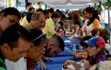 Collecte de signatures le 27 avril 2016 à Caracas pour  enclencher la première étape du processus de référendum révocatoire contre le président Maduro
