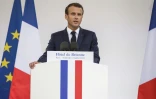 Le président Emmanuel Macron s'exprime après avoir promulgué la Loi de programmation militaire (LPM) 2019-2025, prévoyant une hausse des crédits de défense, le 13 juillet 2018 à Paris 