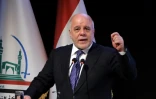Le Premier ministre irakien Haider al-Abadi s'exprime lors d'une cérémonie dans la ville sainte chiite de Najaf, le 7 janvier 2018