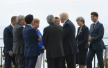 De G à D: Le président du conseil européen Donald Tusk, de la Commission européenne Jean-Claude Juncker, le Premier ministre japonais Shinzo Abe, la Chancelière allemande Angela Merkel, le premier ministre italien Paolo Gentiloni, le président français Emmanuel Macron, américain Donald Trump, la Première ministre britannique Theresa May et le Premier ministre Canadien Justin Trudeau à Taormina (Italie) le 26 mai 2017