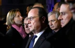 Le président François Hollande (c), accompagné du ministre de l'Intérieur Bernard Cazeneuve (g), et du Premier ministre Manuel Valls (d), s'exprime devant le Bataclan le 14 novembre 2015 au petit matin