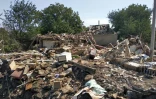 Une maison détruite par un bombardement russe à Tchapliné, centre de l'Ukraine, le 25 août 2022
