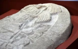 Détail d'un autel vieux de 1.500 ans récemment découvert sur un site archéologique du nord du Guatemala, au musée d'archéologie et d'ethnologie de Guatemala city, le 12 septembre 2018
