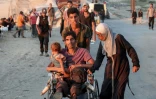Des Palestiniens fuient la ville de Gaza en direction du sud, le 13 septembre 2025