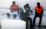 Des migrants dans le centre d'accueil de l'île italienne de Lampedusa le 4 août 2022