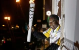 Pelé avec la flamme olympique, le 22 juillet 2016 à Santos