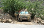 Un véhicule blindé appartenant aux forces du gouvernement yéménite soutenu par l'Arabie saoudite, près du front de Jabal Han à l'ouest de Taëz, le 3 octobre 2026