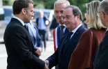 Le président Emmanuel Macron serre la main de l'ancien président François Hollande à Tulle, en CorrÚze, le 10 juin 2024