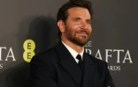 L'acteur américain Bradley Cooper à son arrivée à la cérémonie des Bafta, le 18 février 2024 à Londres