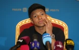 Le joueur du PSG Kylian Mbappé en conférence de presse à Doha le 14 janvier 2019