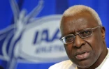 Le président de l'IAAF de l'époque, Lamine Diack, lors d'une conférence de presse à Berlin, le 14 août 2009