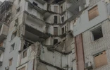 Un immeuble endommagé par des attaques aériennes, le 30 octobre 2026 à Kherson, dans le sud de l'Ukraine 
