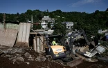 Démolition des cases en tôle du bidonville Talus 2, le 22 mai 2023 à Mayotte