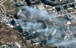 Image satellite Maxar montrant des imeubles en feu à Marioupol, sud-est de l'Ukraine, le 22 mars 2022
