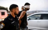 Image tirée d'une vidéo de la police israélienne, le 11 septembre 2021, montrant l'arrestation près de Nazareth de Zakaria al-Zoubeidi, l'un des six Palestiniens échappés d'une prison quelques jours auparavant
