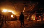 Incendie dans la station de métro Macul de Santiago du Chili pendant de violentes manifestations antigouvernementales, le 19 octobre 2019