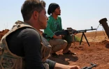 Des rebelles syriens dans la région de Kafr Zeta dans la province d'Idleb (nord-ouest) se préparent à un possible assaut du régime, le 30 août 2018