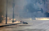 Des corps gisent dans une rue de Soueida, dans le sud de la Syrie, après l'entrée des forces gouvernementales le 15 juillet 2025