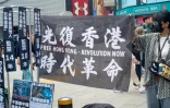 Rassemblement à Taipei, le 23 mars 2024, contre la nouvelle loi de Hong Kong sur la sécurité nationale prévoyant des peines de prison à perpétuité pour la trahison ou l'insurrection