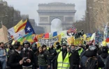 Manifestants "gilets jaunes" le 16 mars 2019 sur les Champs-Elysées