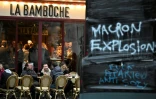 Une pancarte sur laquelle est écrit "Macron explosion" dans une rue de Rennes, en France, le 15 avril 2023