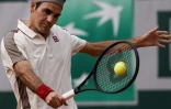 Le Suisse Roger Federer contre l'Allemand Oscar Otte au 2e tour de Roland-Garros, le 29 mai 2019 à Paris