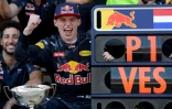 Le pilote néerlandais Max Verstappen exulte après avoir remporté, au volant de sa Red Bull, sa 1ère victoire en Formule 1, lors du Grand Prix d'Espagne, le 15 mai 2016 sur le circuit de Catalogne à Montmelo
