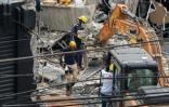 Des équpes de secours sur le site de l'effondrement du toit d'une discothèque à Saint-Domingue, le 9 avril 2025 en République dominicaine