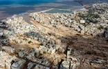 Vue aérienne de la ville de Derna, dévastée par des inondations meurtrières, le 18 septembre 2023 en Libye