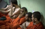 Des jihadistes présumés du groupe Etat islamique (EI) détenus dans une prison kurde du nord-est syrien, le 26 octobre 2019