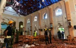 Décombres à l'intérieur de l'église Saint-Sébastien de Negombo, le 22 avril 2019 au lendemain d'une série d'explosions meurtrières
