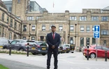 Nijam Uddin Mohammed devant l'hôpital de Bradford où il sert à temps partiel d'interprète. Le 20 août 2018