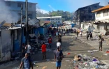 Une rue marquée par les émeutes à Honiara, le 26 novembre 2021