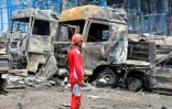 Photo fournie par la Croix rouge iranienne le 28 avril 2025 des dégâts au port de Shahid Rajaï suite à l'incendie qui a commencé le 26 avril 2025