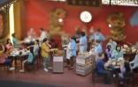 Reproduction d'une scène au restaurant dans le vieil Hong Kong, photo prise le 23 juin 2021 dans le studio de TOMA miniatures