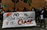 Dans le quartier de Carabanchel à Madrid, le 20 septembre 2020, lors d'une manifestation contre les nouvelles restrictions anti-coronavirus imposées à seulement certains quartiers de la ville