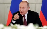 Le président russe Vladimir Poutine, le 16 mars 2018 à Saint-Pétersbourg 