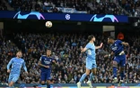 Le défenseur autrichien du Real Madrid David Alaba (d), lors de la demi-finale aller de la Ligue des Champions contre Manchester City, le 26 avril 2022 à l'Etihad Stadium