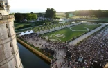 Le DJ britannique Carl Cox mixe dans les jardins à la française du château de Chambord, le 16 juillet 2018