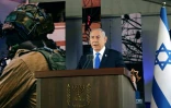 Le Premier ministre israélien Benjamin Netanyahu s'exprime lors d'une cérémonie marquant le 1er anniversaire selon le calendrier hébraïque de l'attaque du Hamas du 7 octobre 2023, au cimetière militaire du mont Herzl à Jérusalem, le 27 octobre 2024