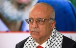 Le Premier ministre des rebelles houthis du Yémen, Ahmad Ghaleb al-Rahwi, rend visite aux bureaux du mouvement palestinien Hamas à Sanaa pour présenter ses condoléances après la mort de Yahya Sinouar, chef du mouvement palestinien Hamas, tué par Israël, le 20 octobre 2024