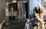 Policiers et experts à la station de métro  Maalbeek le 22 mars 2016 à Bruxelles 